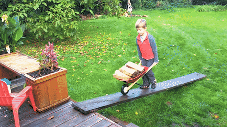 The Kids Chopping & Loading Firewood