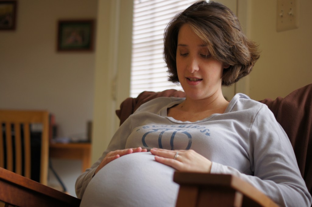 My wife at 40+ weeks pregnant with our second