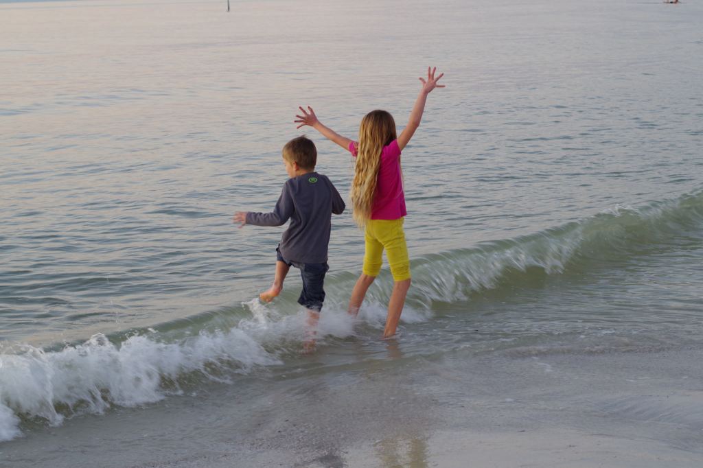 The kids jumping into the ocean at Clearwater Beach